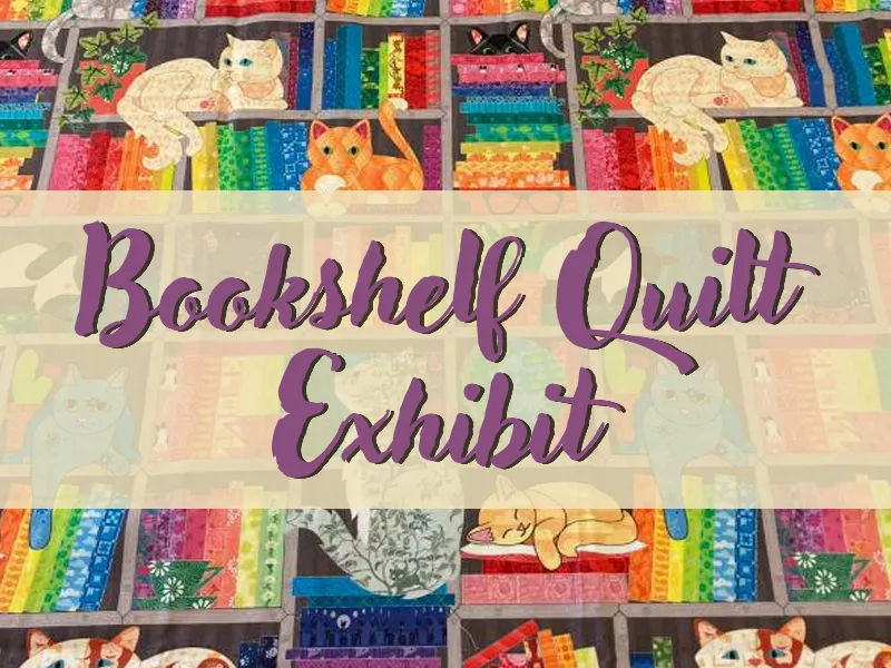 Bookshelf quilt with cats