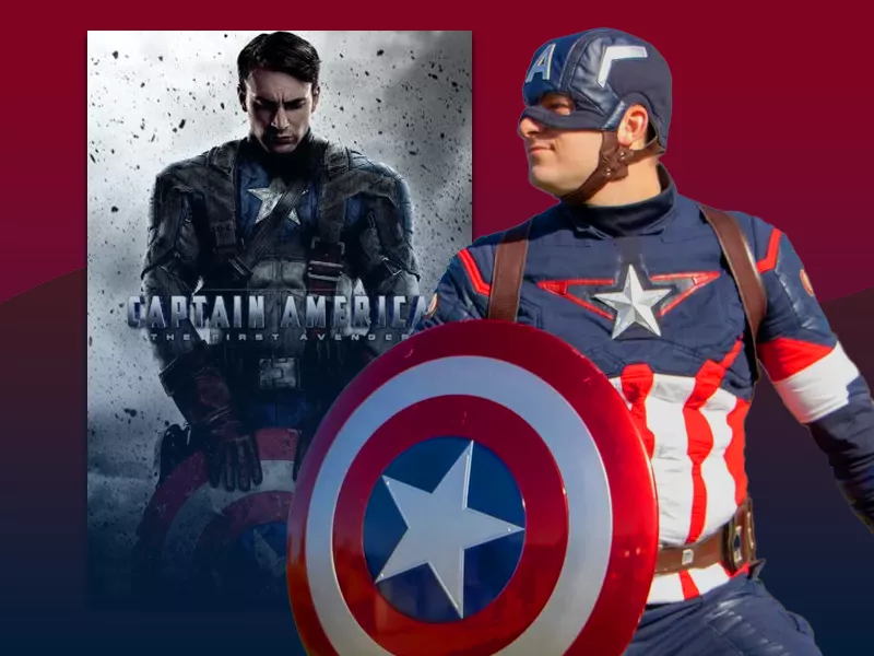 The American Hero poses alongside the movie poster for Captain America: The First Avenger