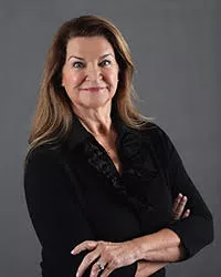 Professional headshot for LB Crawford