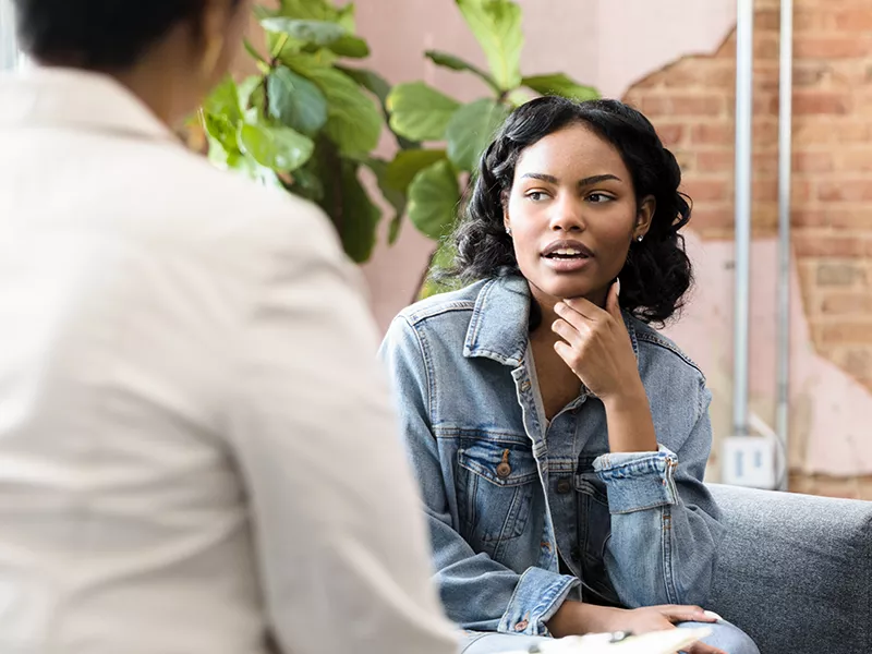 teen talking with a therapist