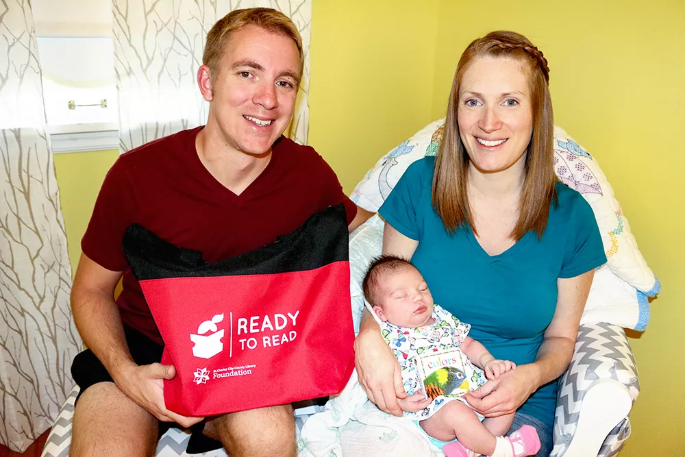 Family with Ready to Read materials
